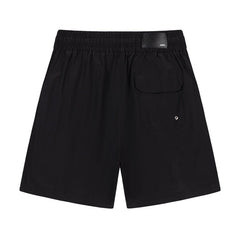 AMIRI Starburst logo shell swim shorts